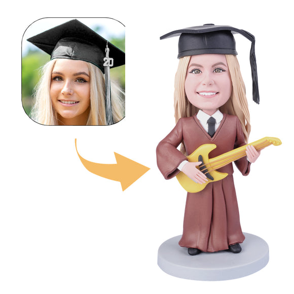 Female graduate is playing guitar